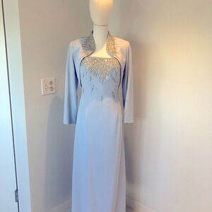 Mother of Bride dress worn once. Size 6
Light blue. Fully lined
